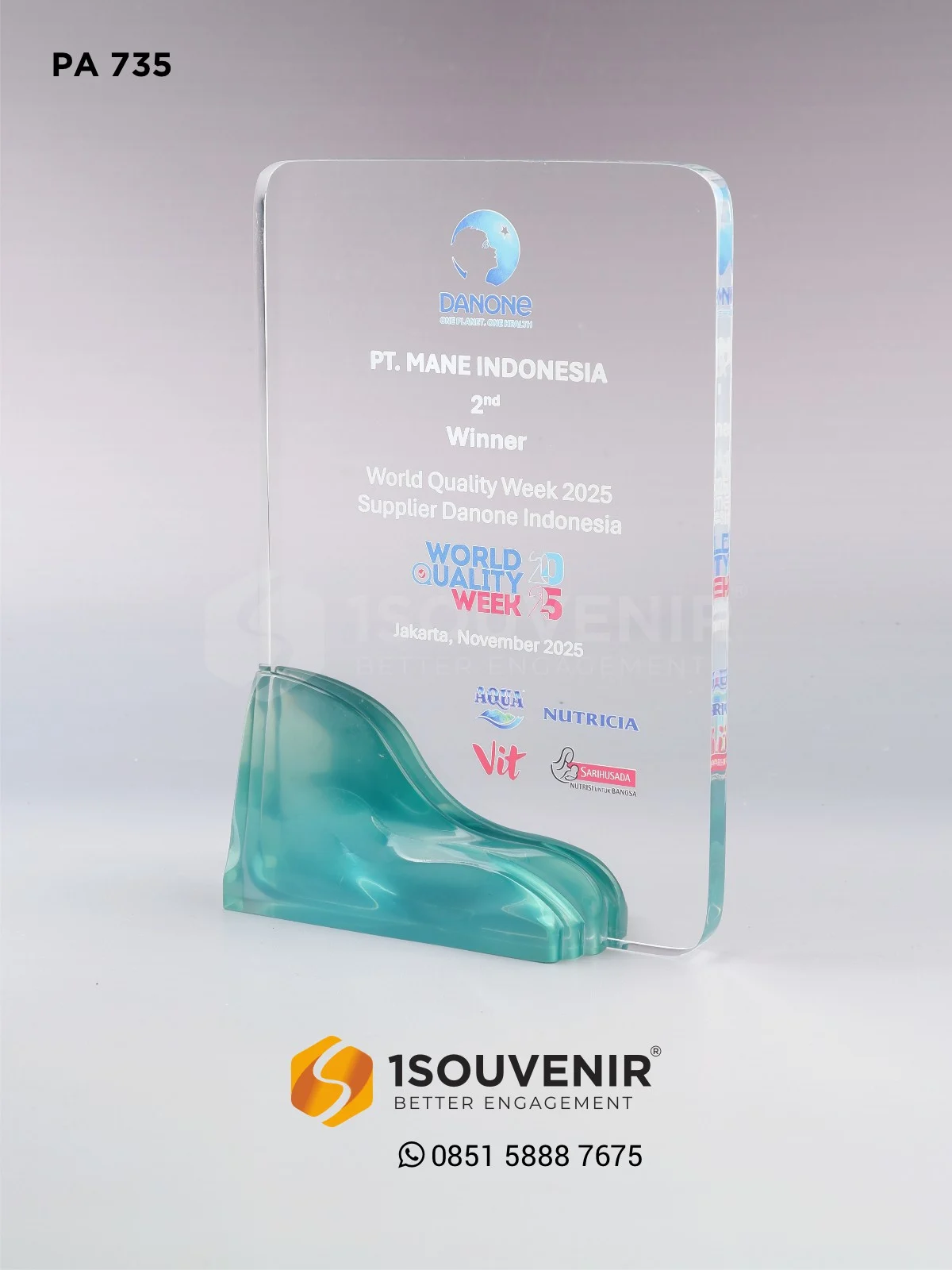 Plakat Akrilik World Quality Week 2025 Penghargaan Supplier Danone Indonesia untuk PT Mane Indonesia